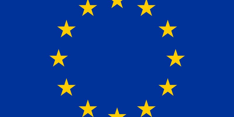 EU flag with blue background and yellow stars