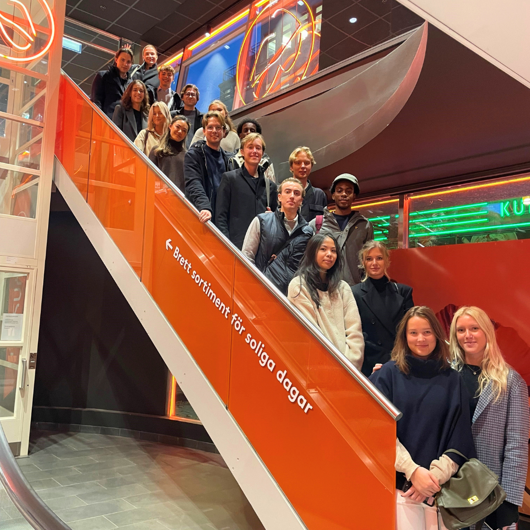 Students standing in line at the stairs of a Synsam store in Stockholm