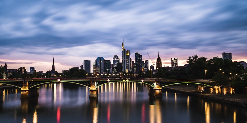 Bridge in front of business skyline