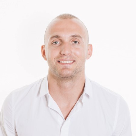 headshot of Fisnik Zahiti