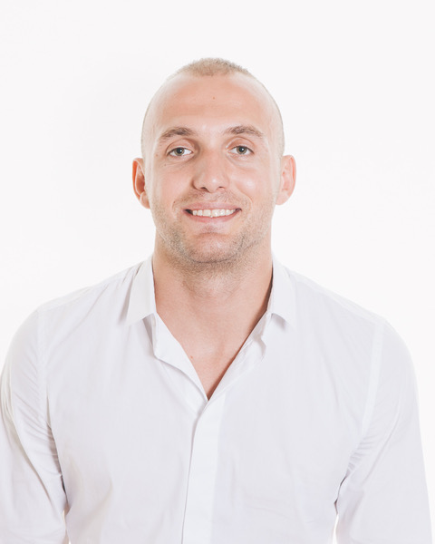 headshot of Fisnik Zahiti