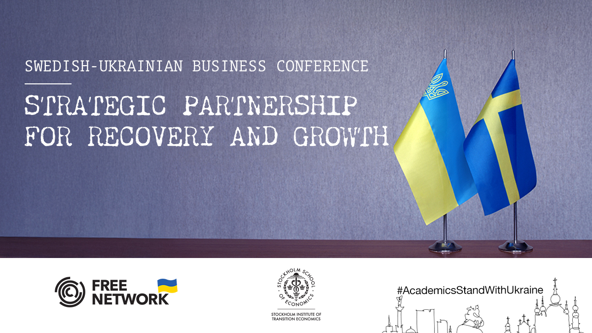 Tabletop flags of Ukraine and Sweden on a gray blurred background.