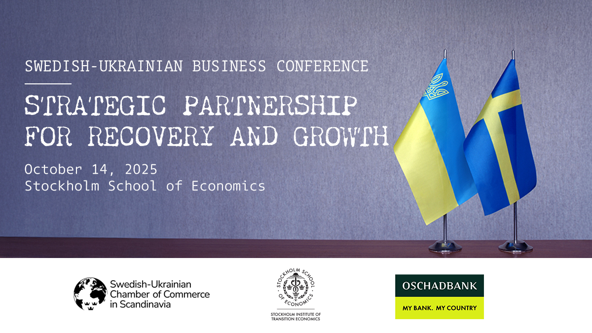Tabletop flags of Ukraine and Sweden on a gray blurred background.