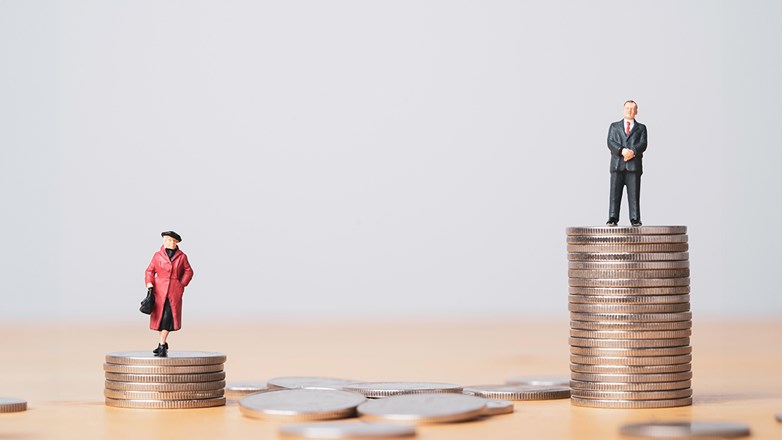 Miniature figure of businessman standing on higher than coins stacking of businesswoman for inequality of gender male and female of income and salary concept.