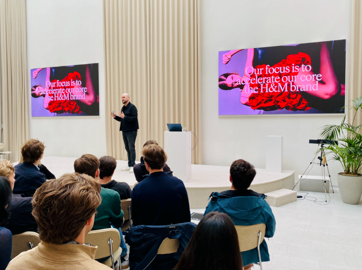Sam Miller, Global Head of Franchise at H&M Group holds a presentation for students at H&M's HQ.
