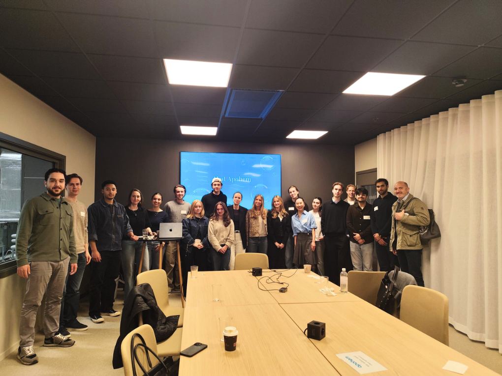 Group picture of students and representatives from Axel Johnson at Apohem Warehourse.