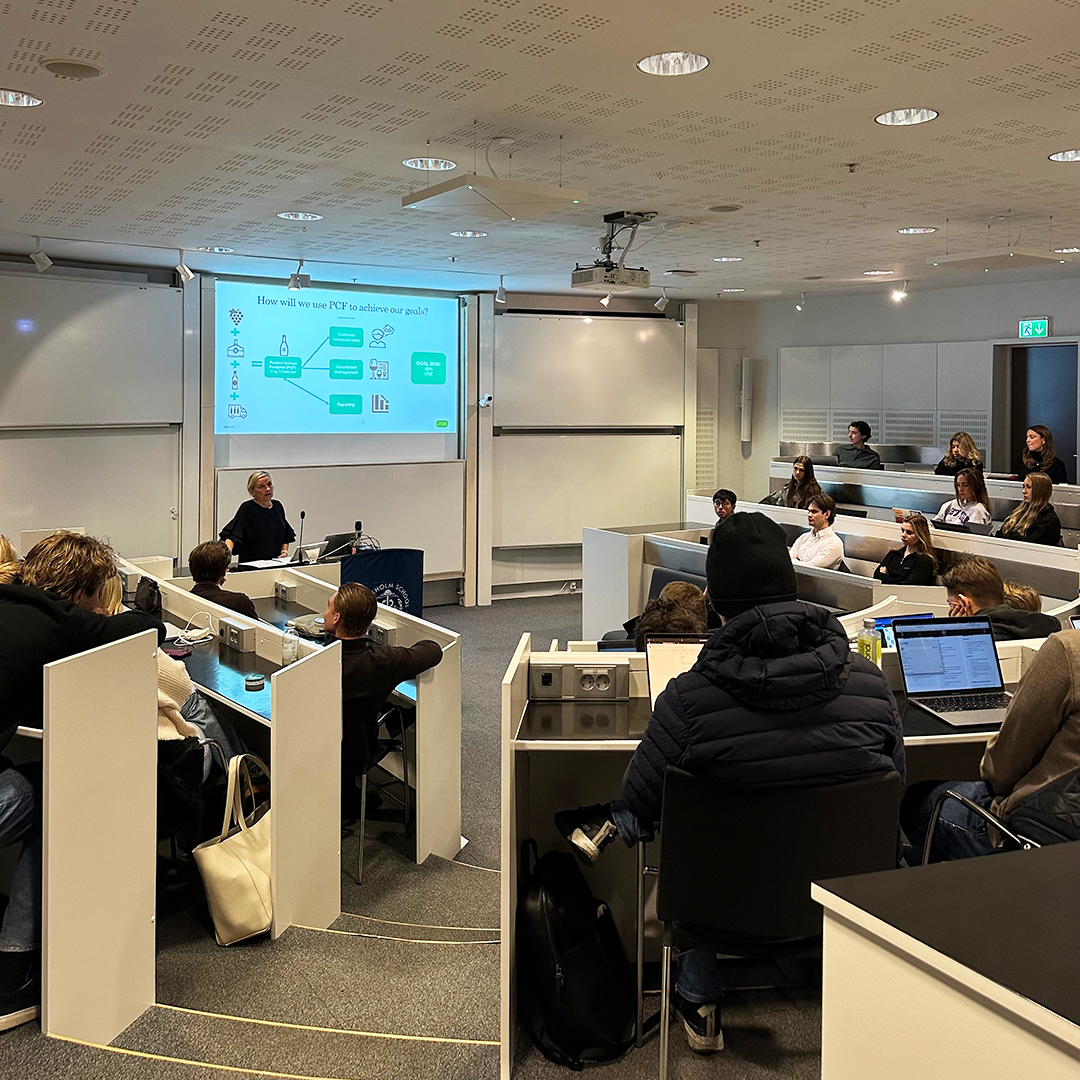 Susanna Westin, Sustainable Strategist, holds a lecture for students in a class room.