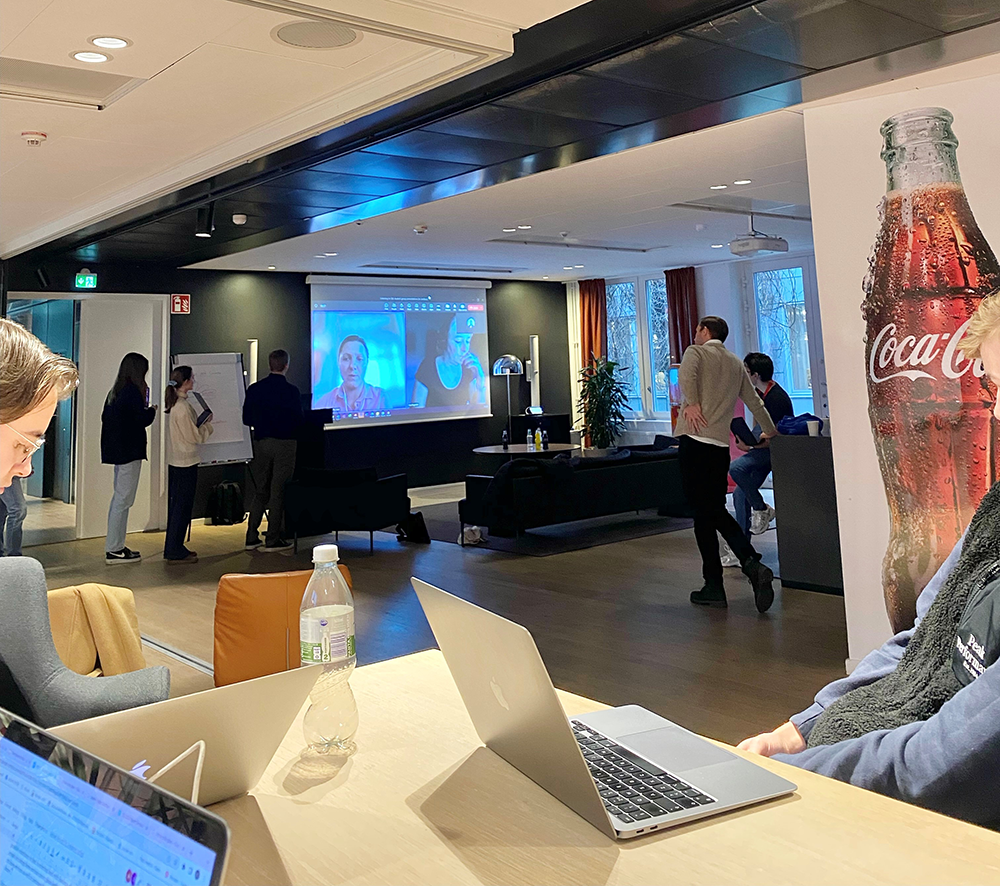 People are looking busy presenting and working on tasks at the Coca-Cola Europacific offices in Jordbro.