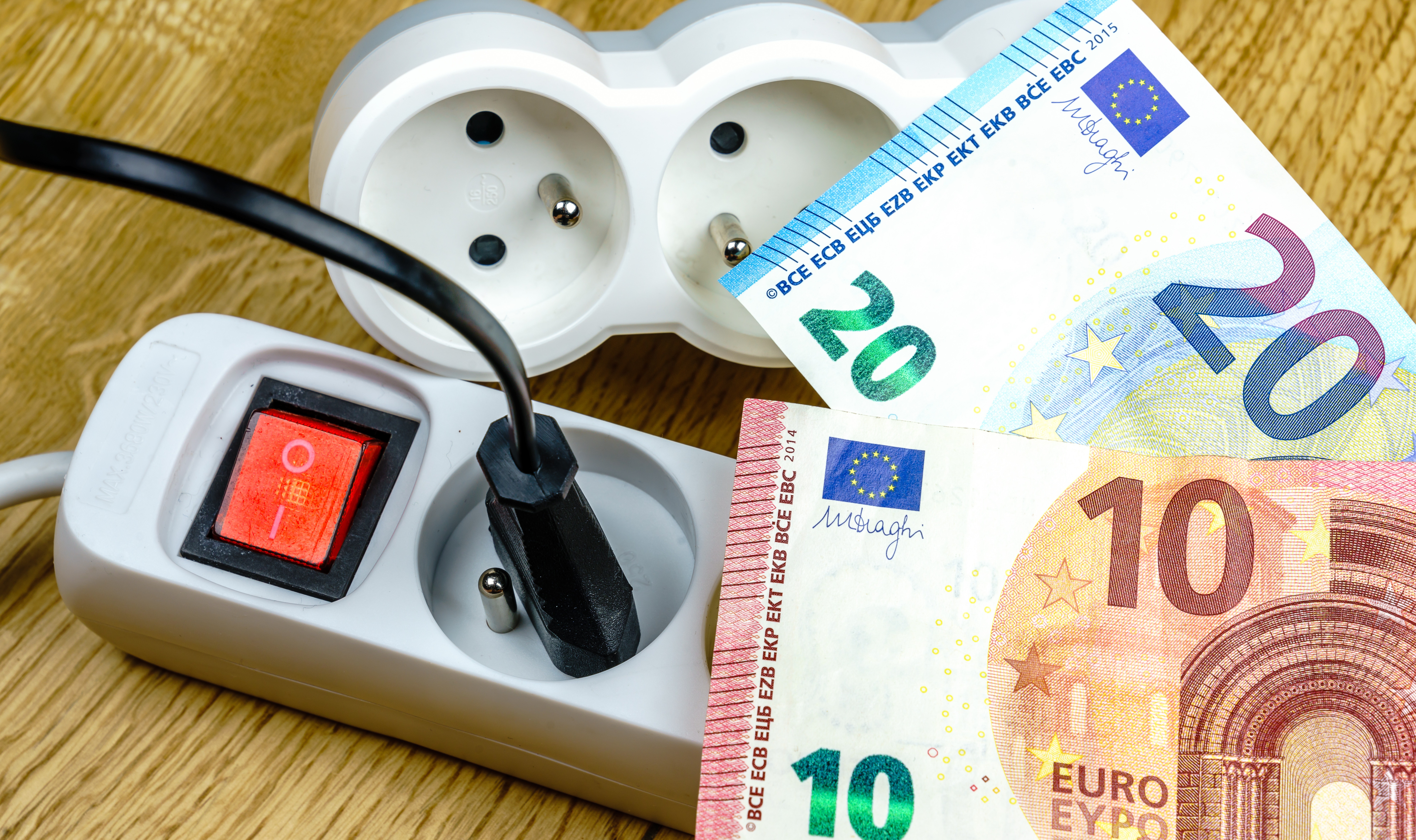 Electricity cost concept - euro banknotes