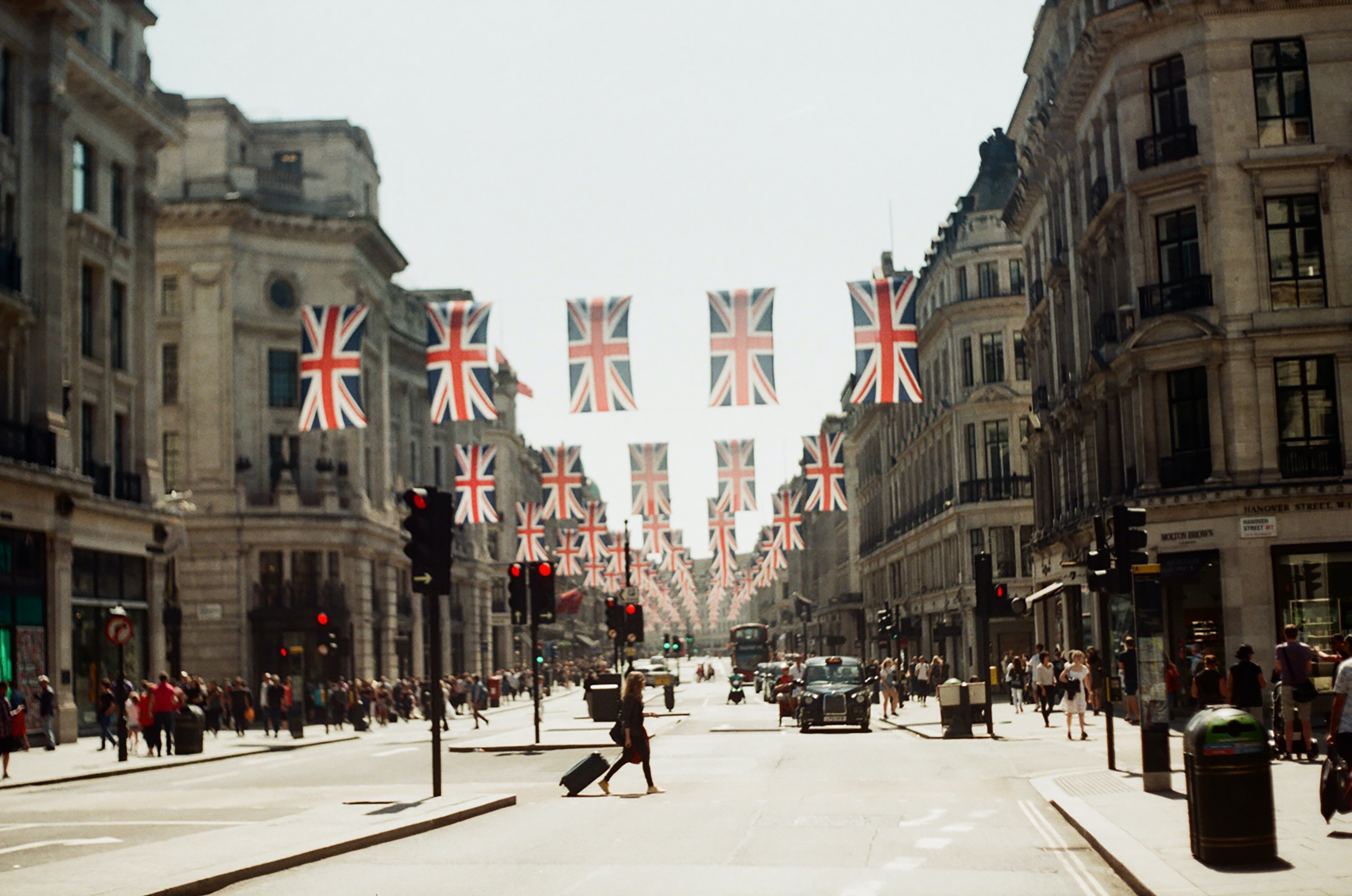 City-scape London with Union Jack flag hanging in street