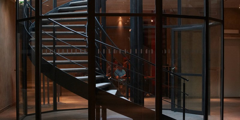 stairway with glass walls
