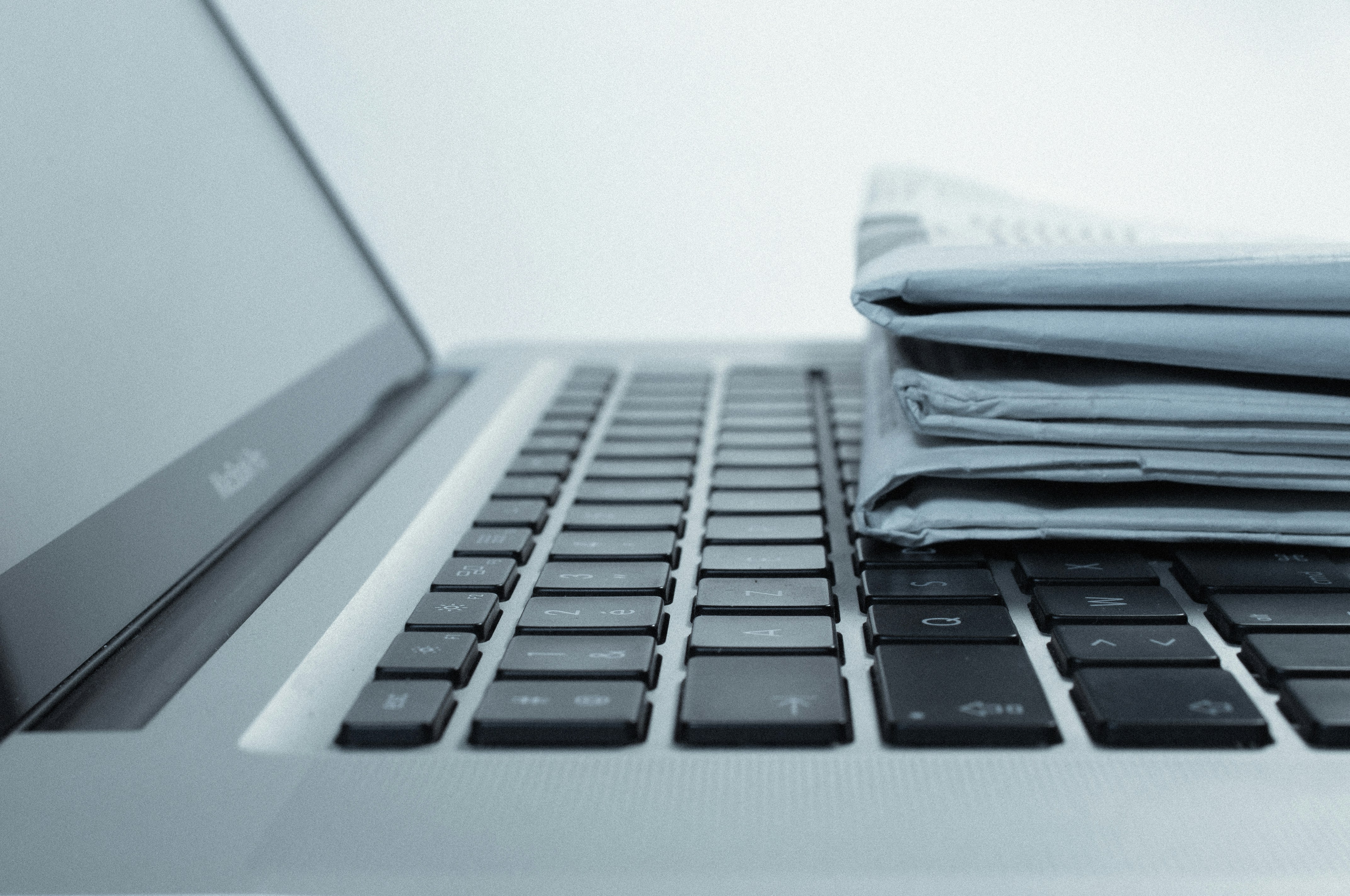 Newspaper and laptop
