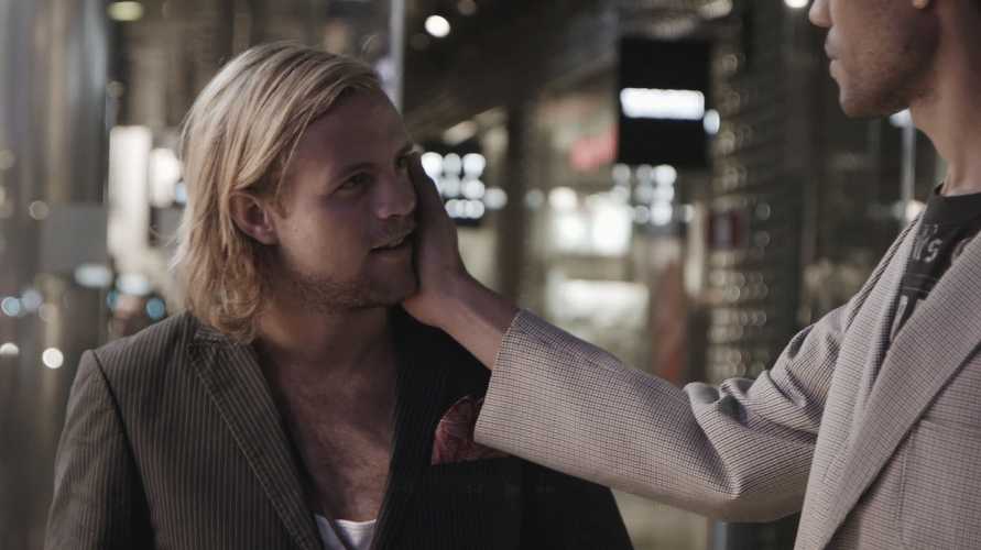 Still from Santiago Mostyn's film Delay, showing the artist moving through Stockholm at night 