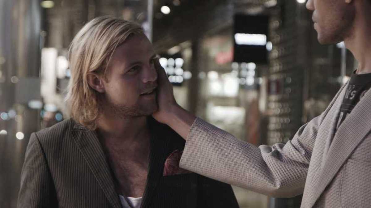 Still from Santiago Mostyn's film Delay, showing the artist moving through Stockholm at night 