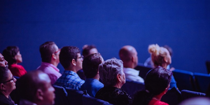 People listening to someone talking