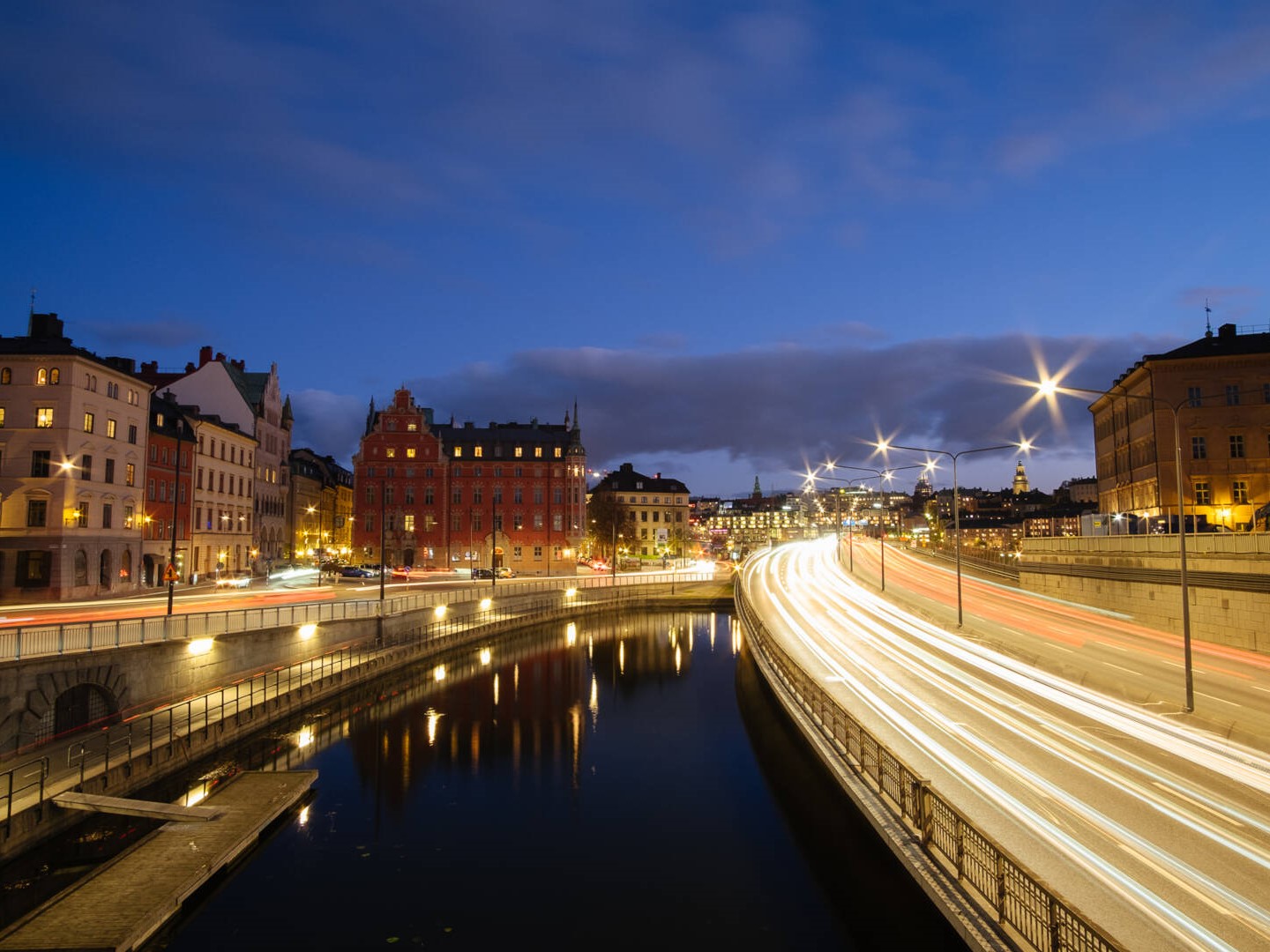 Stockholm during night time with rays of lights from the cars