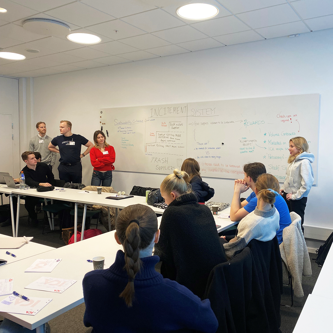 Students looking busy in a conference room