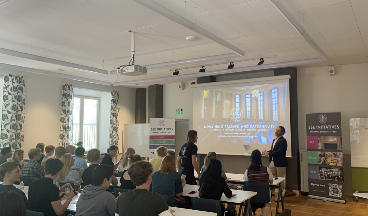 students listening to a presentation