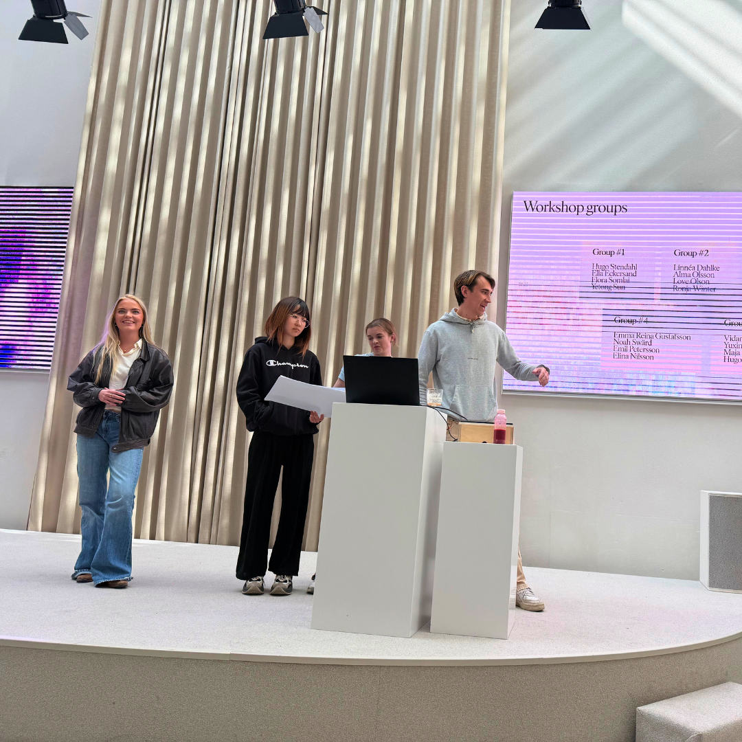 Students presenting at a workshop at HM Head Office