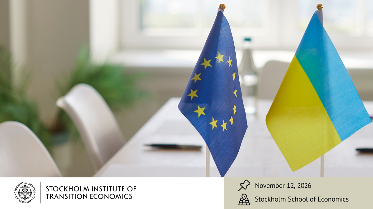 European Union and Ukraine flags standing on table in boardroom symbolizing international negotiations, unity and partnership. The concept of diplomacy, relations. agreement and cooperation. Photo: Shutterstock
