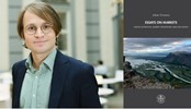 Profile picture beside a picture of dissertation cover