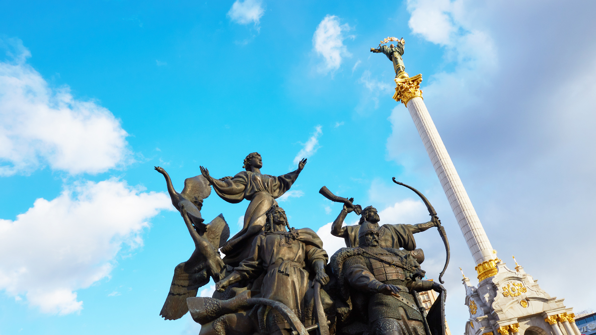 KIEV, UKRAINE - March 19, 2016: Statue of Founders of Kiev and Independence Monument at Independence Square