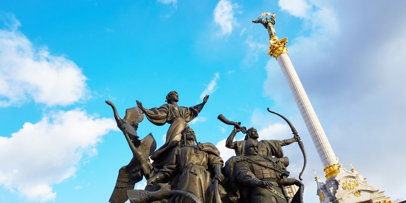 KIEV, UKRAINE - March 19, 2016: Statue of Founders of Kiev and Independence Monument at Independence Square