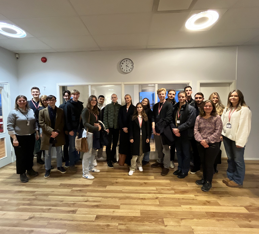 Group of students standing together at Dustin's Warehose in Rosersberg.