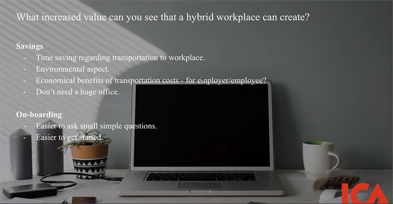 PPT slide showing a typical home office workplace of a clean desk, laptop, a coffee cup, a plant. Header saying "What increased value can you see that a hybrid workplace can create?"