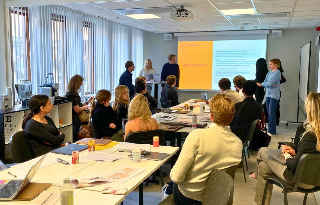 Students presenting at a Synsam workshop