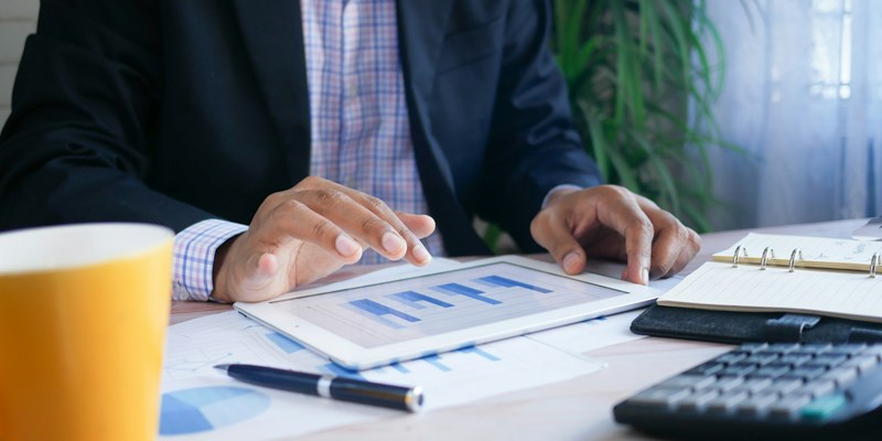 Photo of man at computer