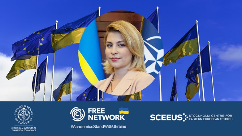 Flags of Ukraine and EU on sky background and Olga Stefanishyna, Deputy Prime Minister of Ukraine
