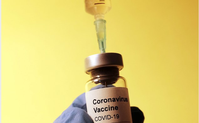 Image of corona vaccine bottle and needle