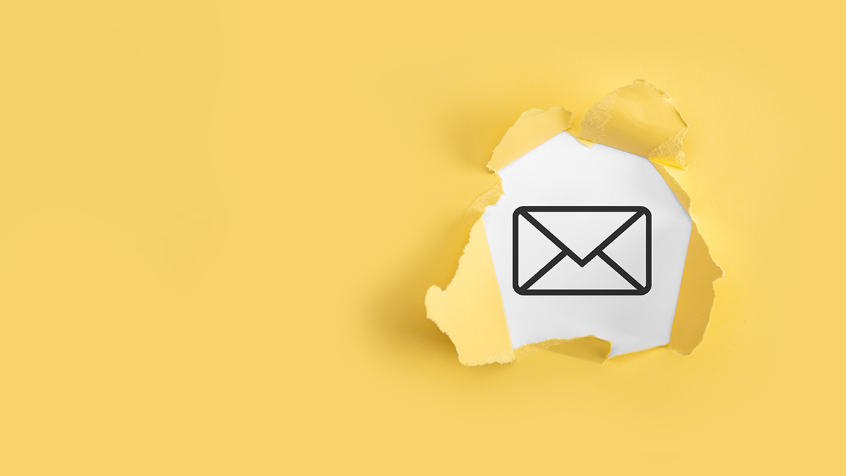 orn yellow paper with letter email icon on white background.