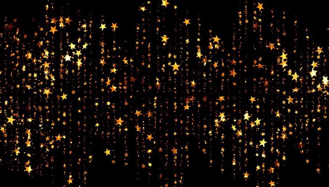 Falling rain of golden glittering stars confetti style on black bakground.