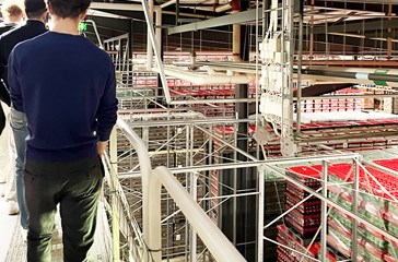 Student on a guided tour in the Coca-Cola Europacific Partners warehouse in Jordbro.