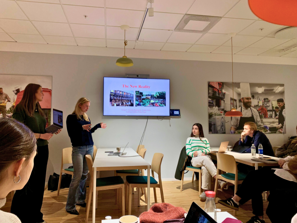 Students presenting at a workshop with ICA.