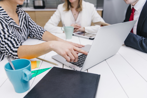 woman-showing-information-laptop.jpg