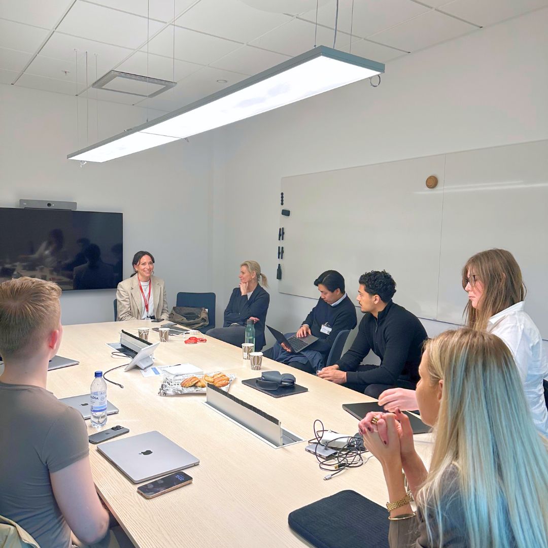 Students discussing careers with  representatives from ICA.