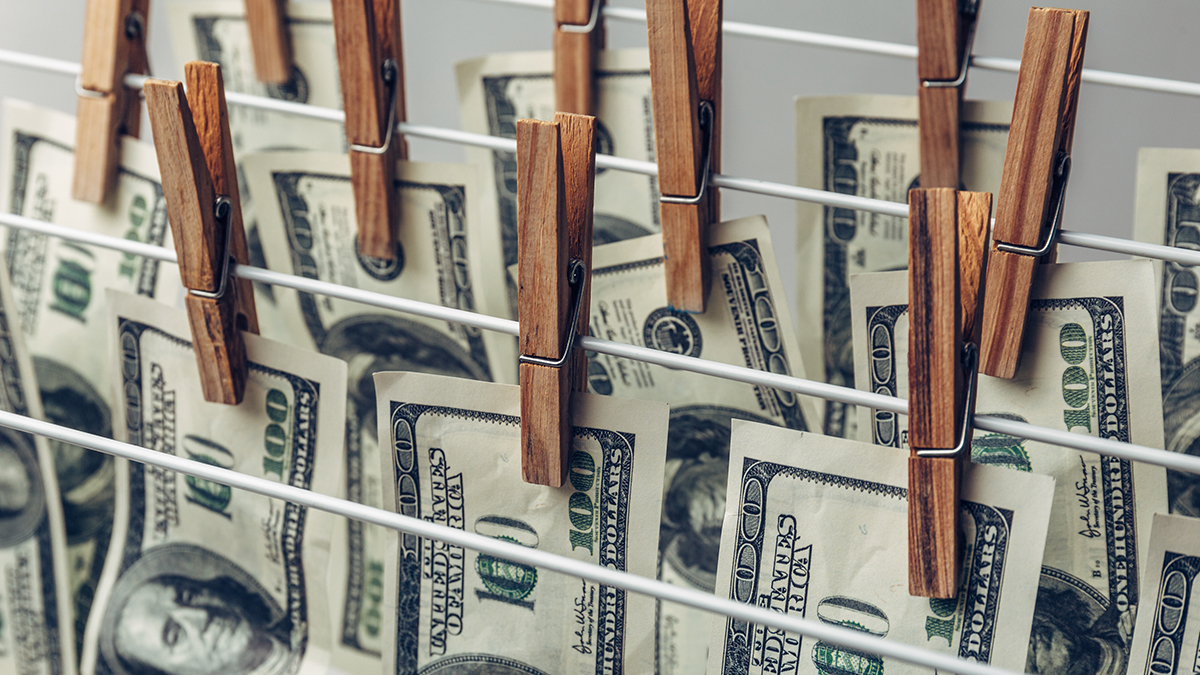 Money Laundering concept. US dollars hung out to dry and clean