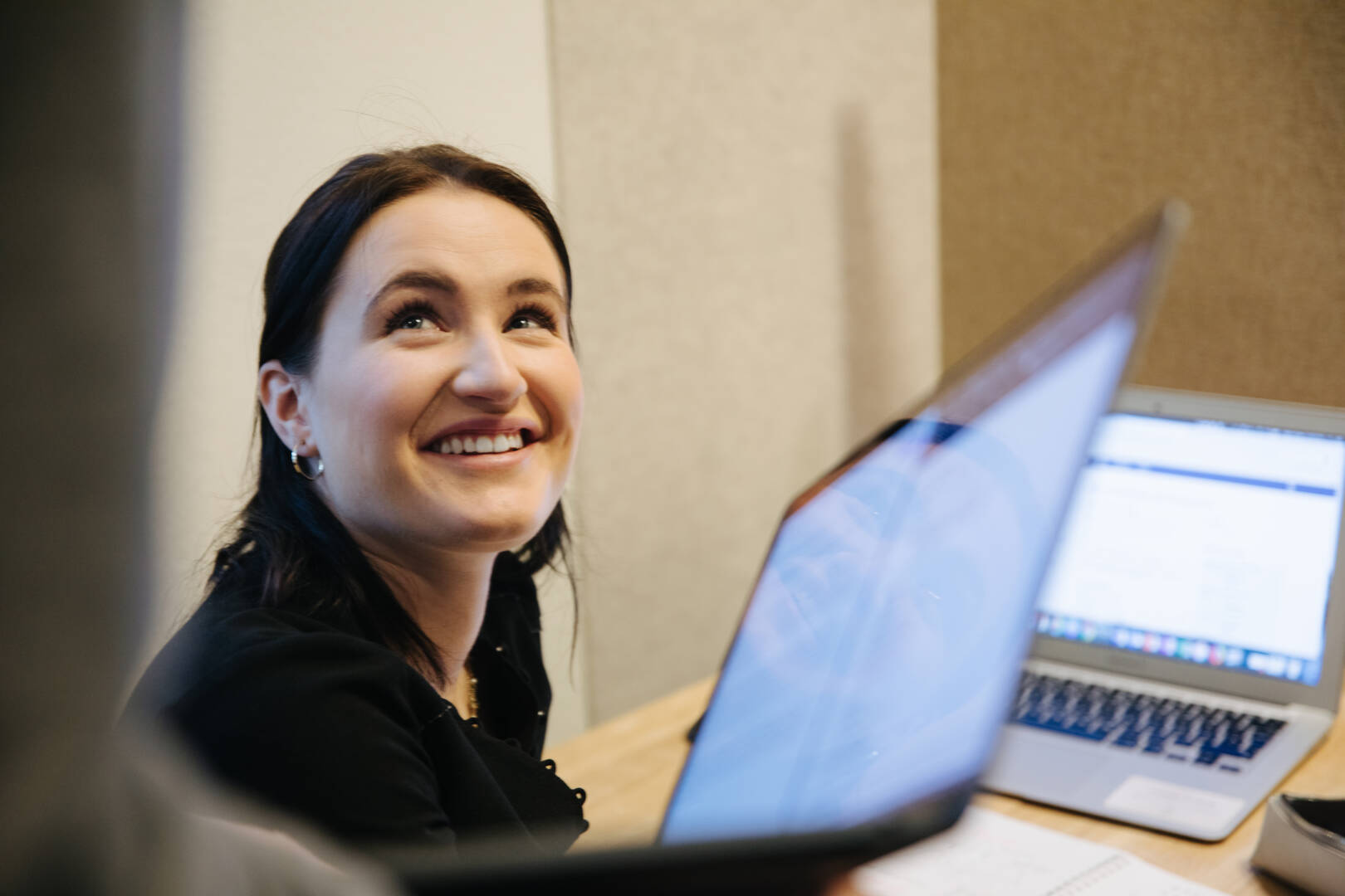 student smiling into the camera