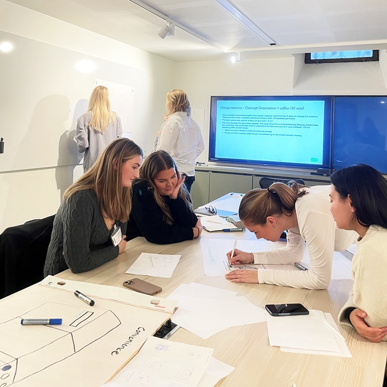 Students looking busy in a workshop