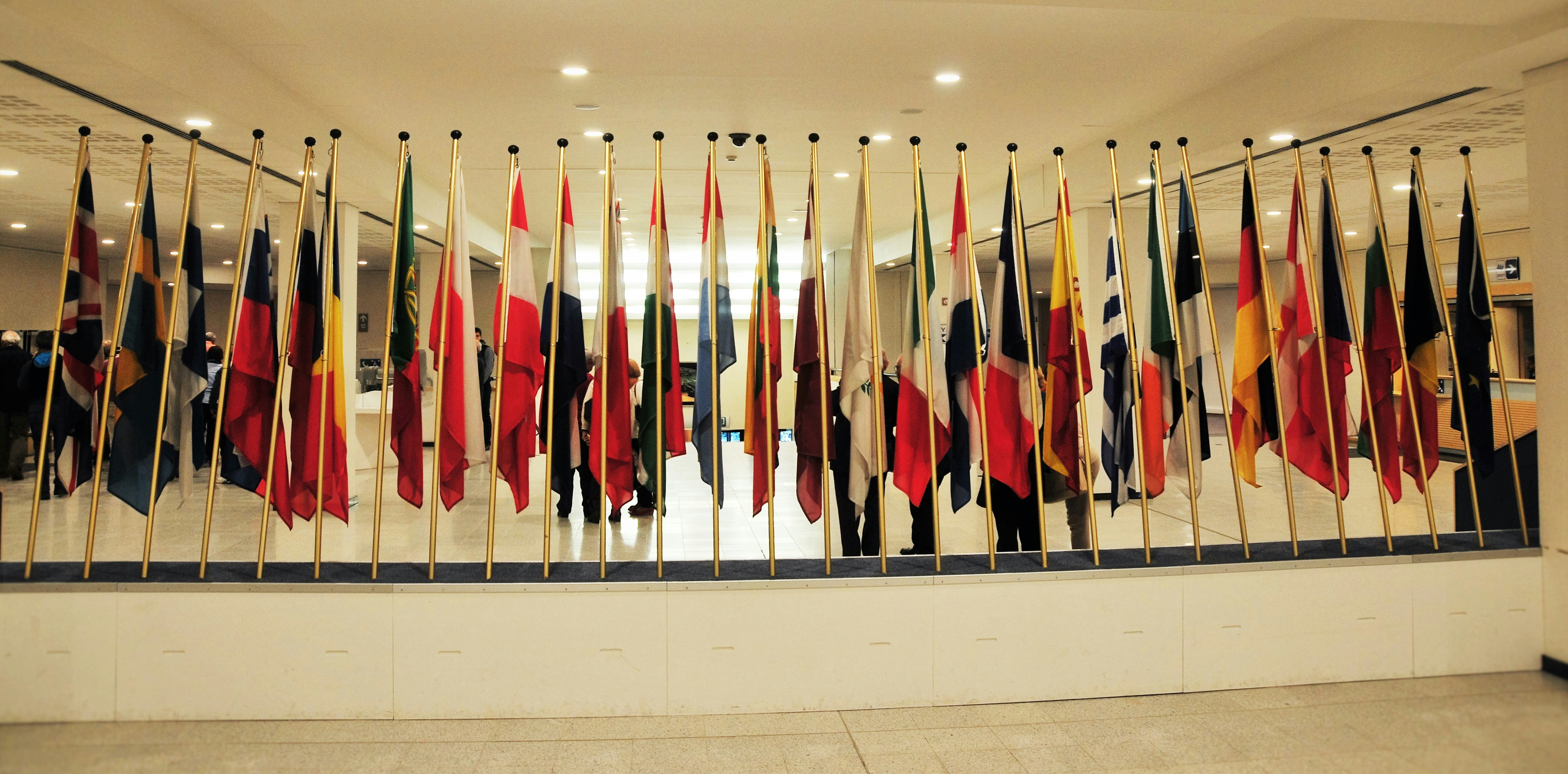 Photo of room with multiple flags