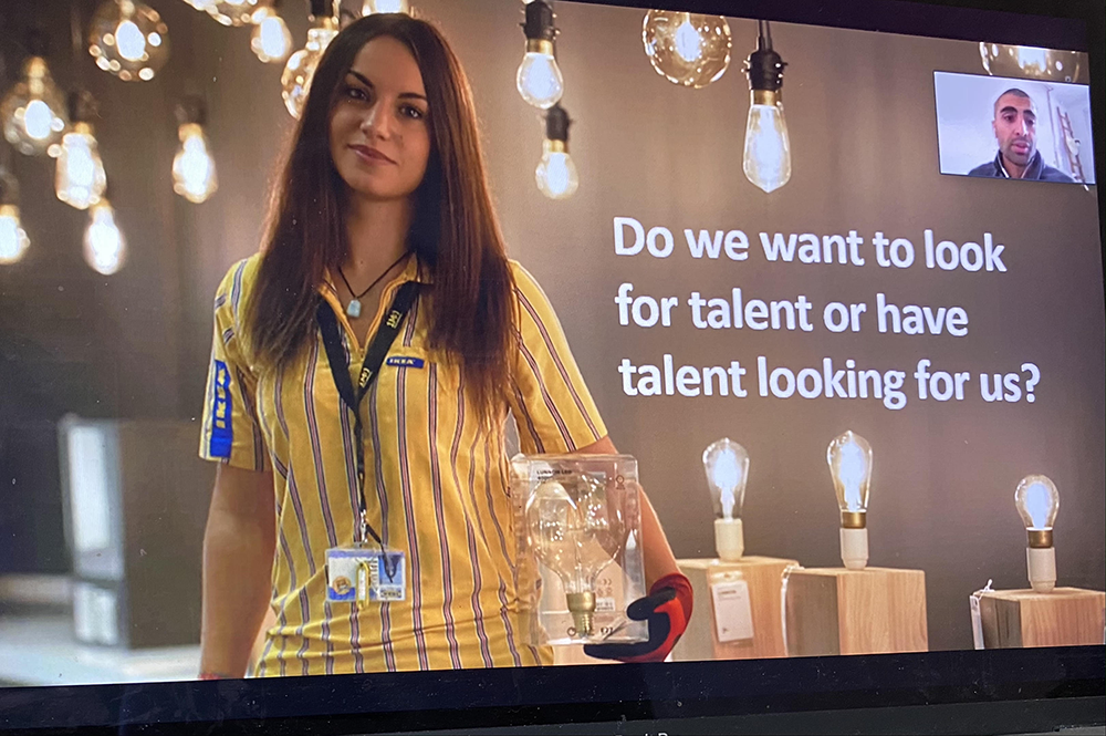 Recruitment picture of a woman smiling in IKEA outfit