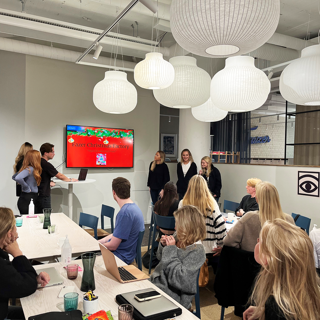 Students presenting an assignment at Fazer HQ, Stockholm.