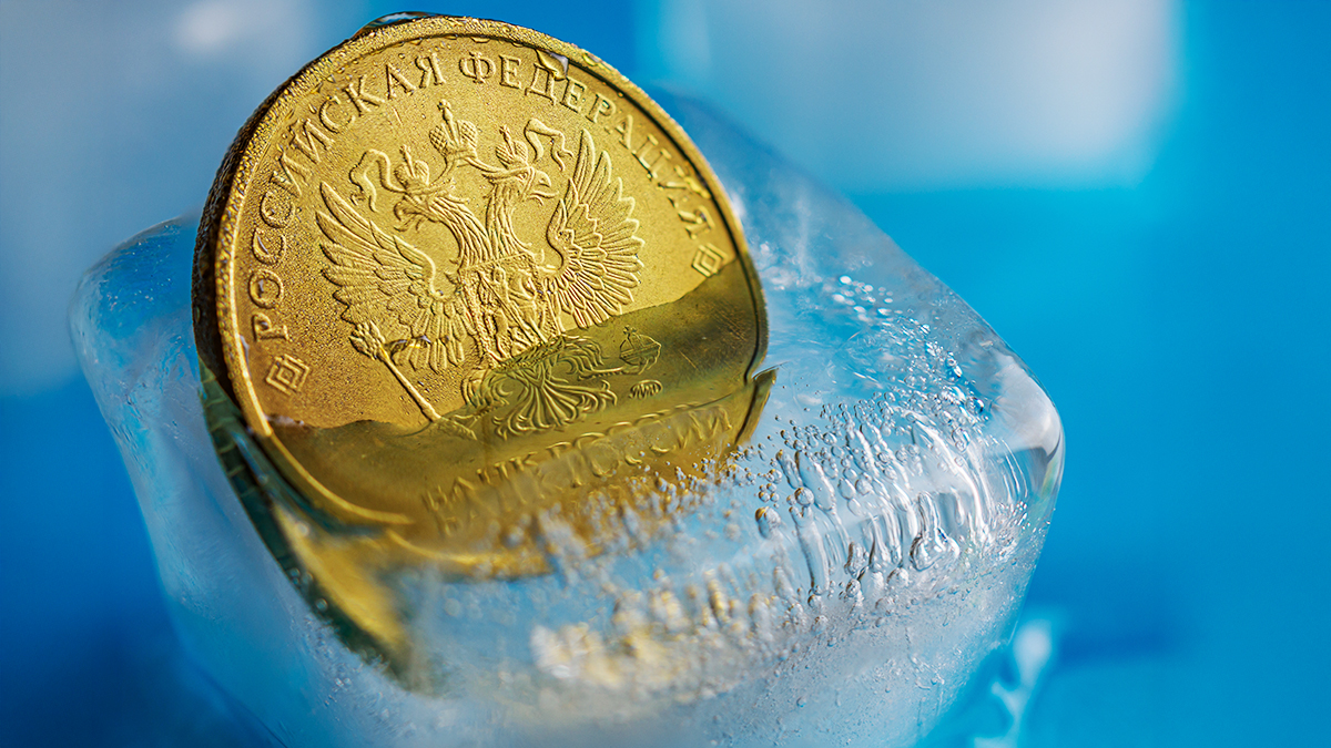 Ten Russian ruble coin in a piece of ice