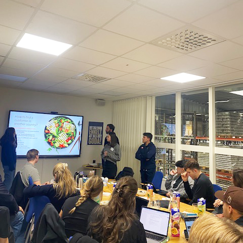 Students presenting in a conference room at Fontana.