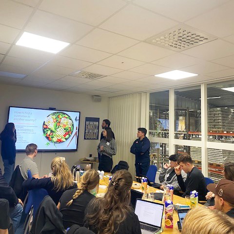 Students presenting in a conference room at Fontana.
