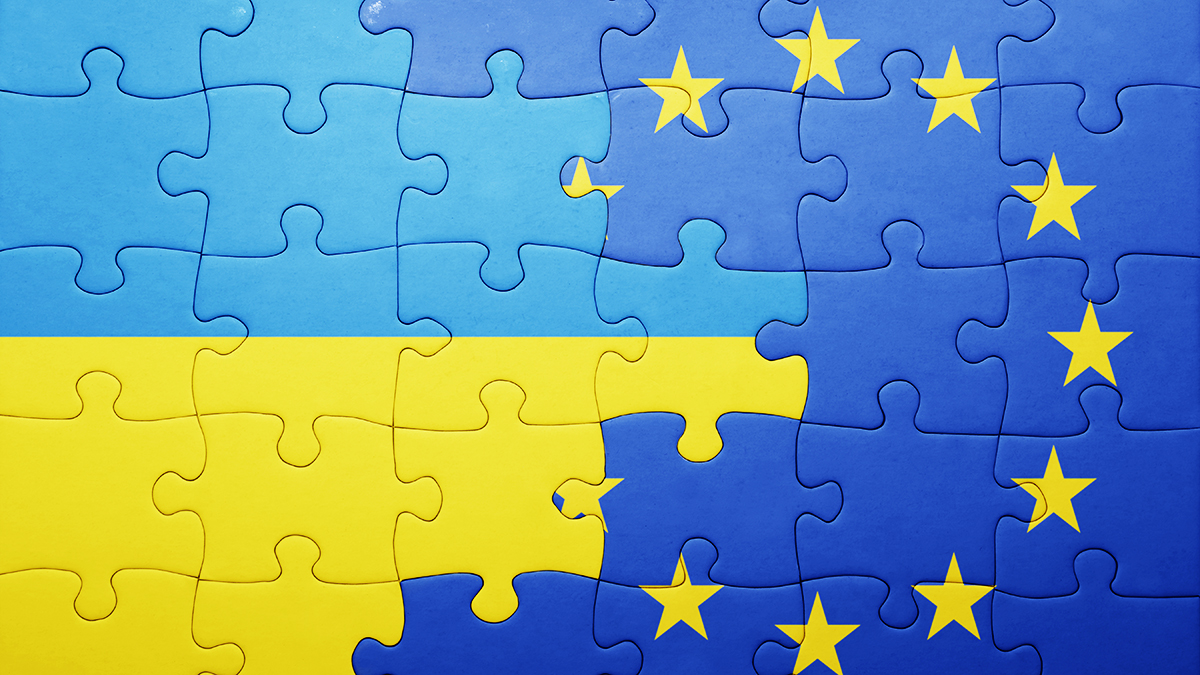 Puzzle with the national flag of Ukraine and European Union.