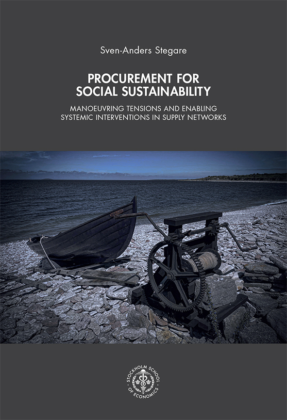 Book cover with a photo showing a dark wooden rowboat that rests on a rocky shoreline beside an old mechanical winch under a dim blue-grey sky, creating a quiet and slightly melancholic coastal scene.